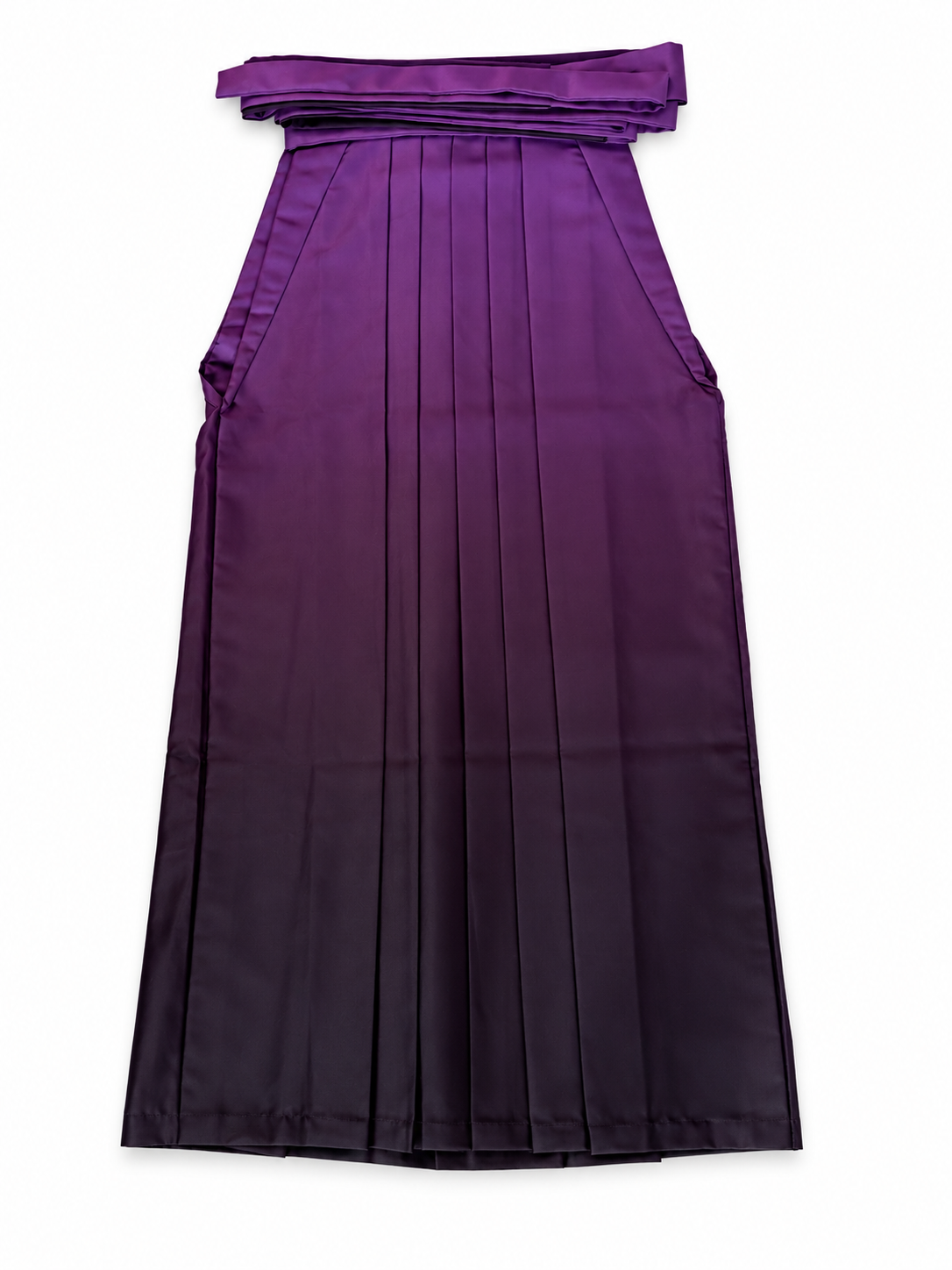 A purple pleated traditional Japanese hakama with a wide waistband and tie detail, shown flat against a white background.
