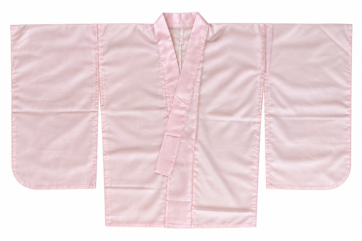 A light pink kimono robe, juban laid flat against a solid white background.