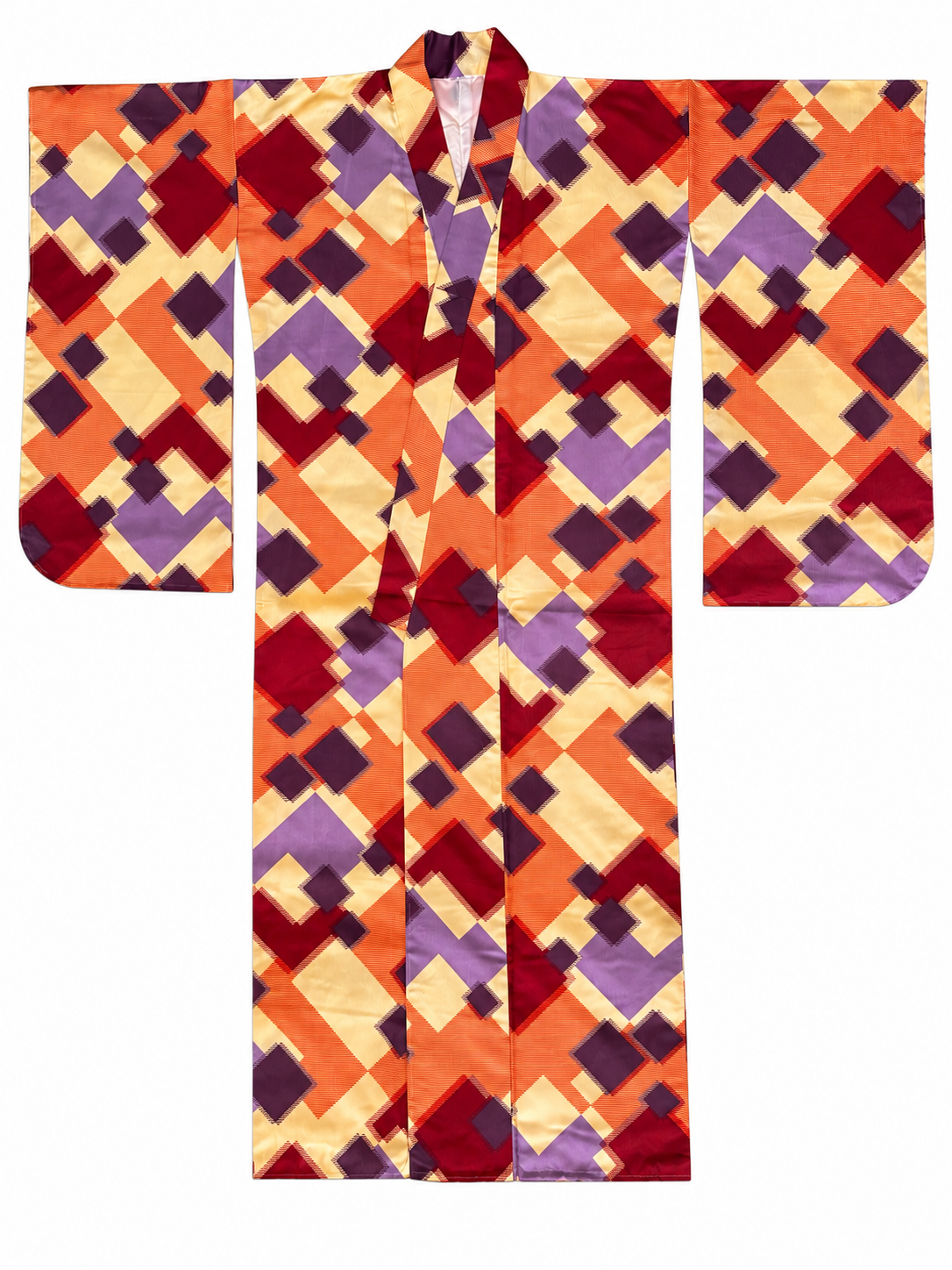 A furisode style kimono with a bold geometric pattern in orange, red, purple, and beige, displayed flat against a white background.