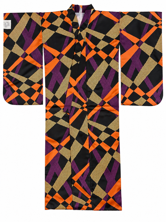 A traditional Japanese furisode kimono with a bold geometric pattern in black, orange, purple, and beige, displayed flat against a white background.